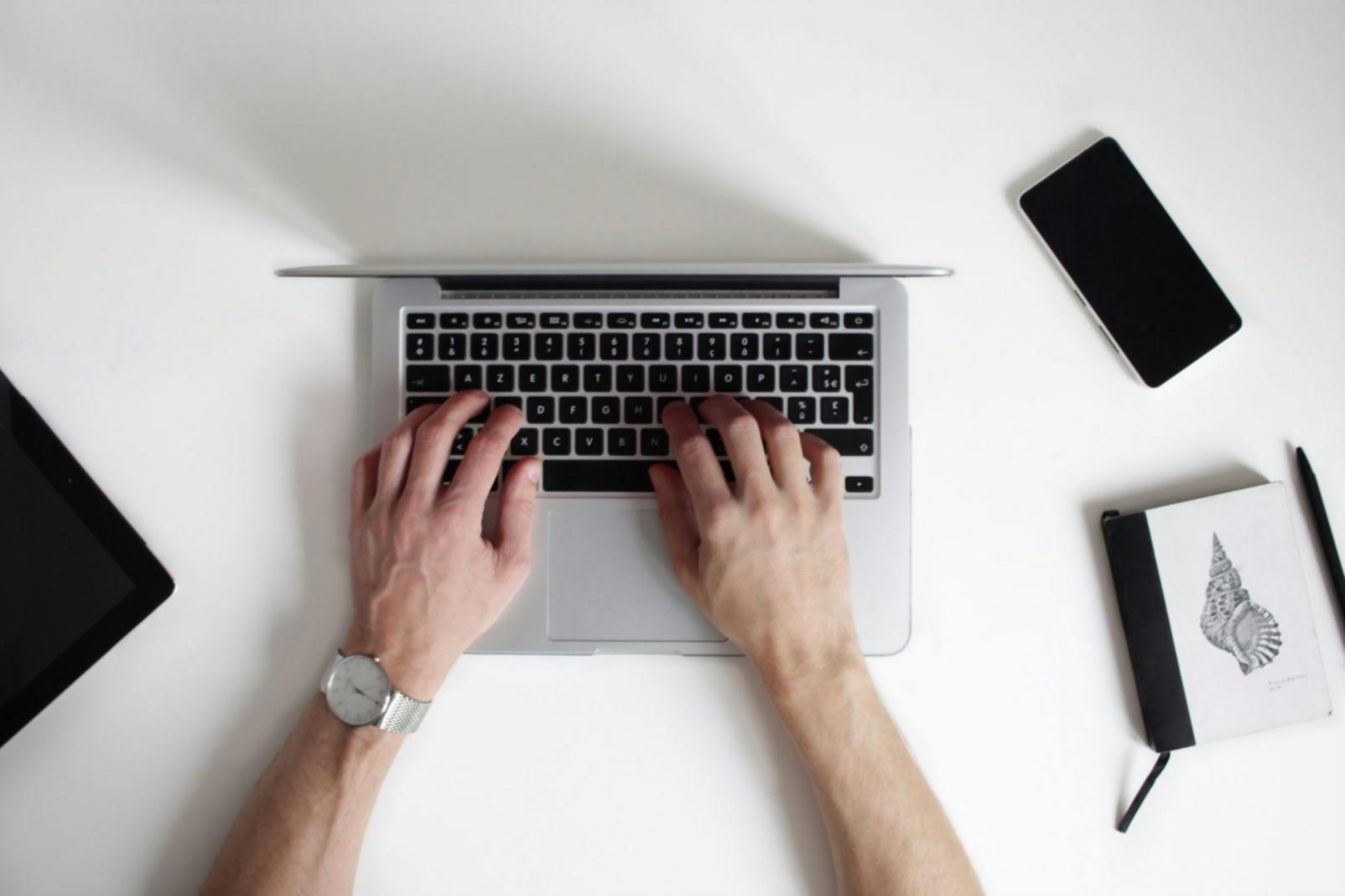 Link building strategy workspace with analytics and planning materials